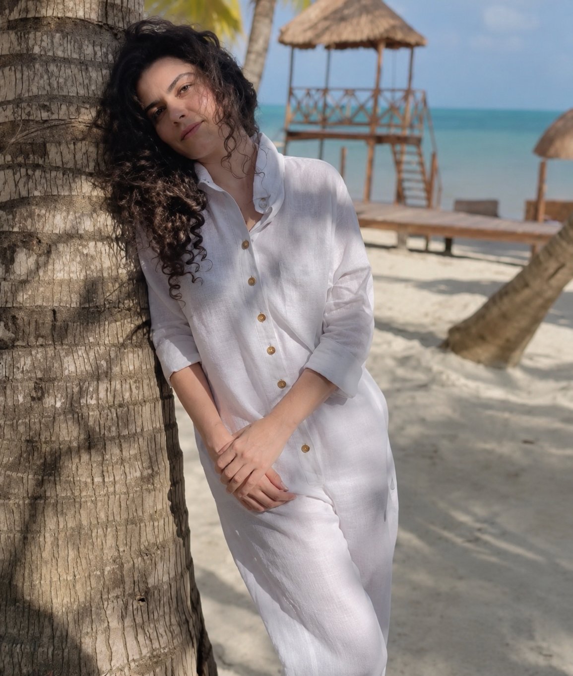 Jumpsuit de lino con botones dorados